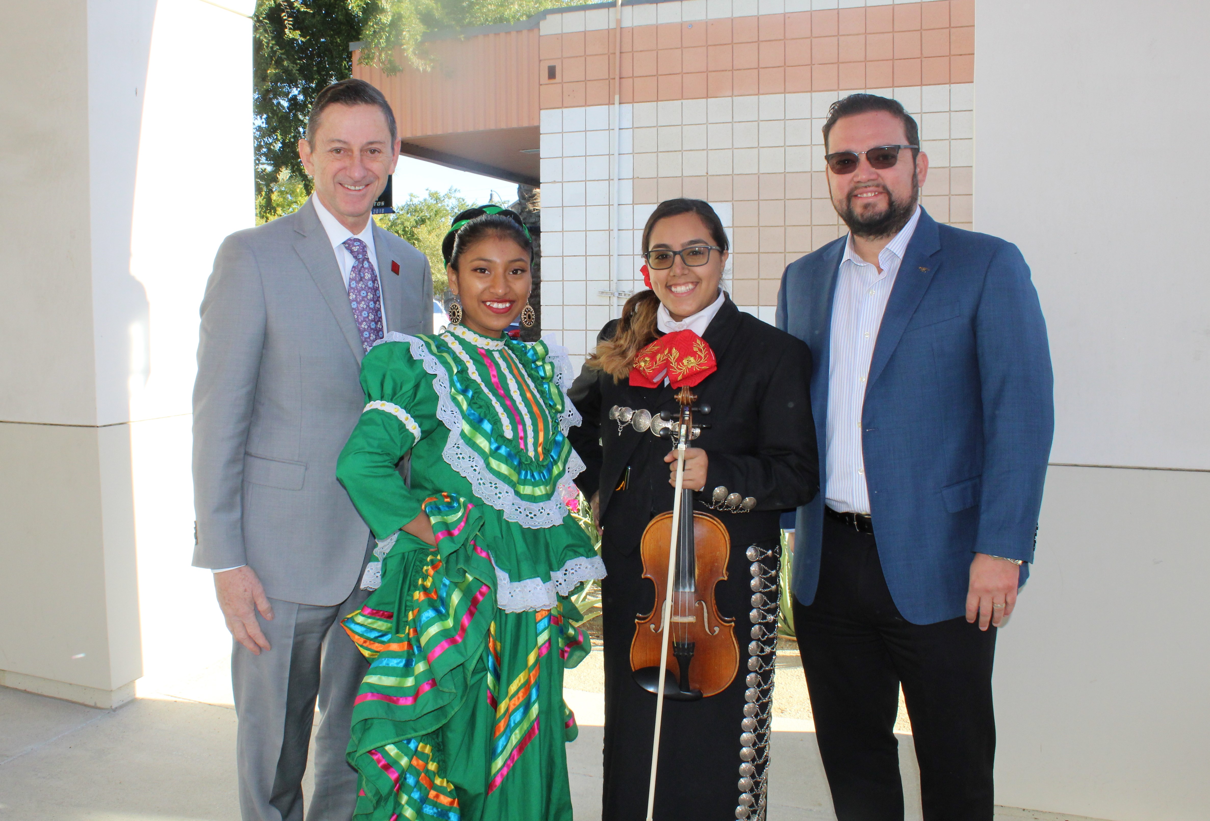 Dr. Joel Kinnamon and Coachella Mayor Steven Hernandez with COD ballet folklorico dancers