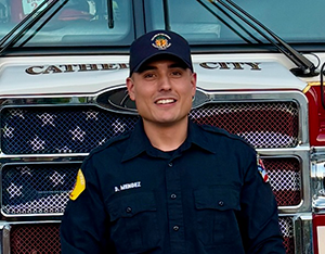 Paramedic standing in front of ambulance