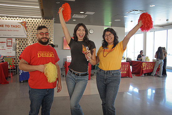 Staff members celebrating at the Roadrunner Rally