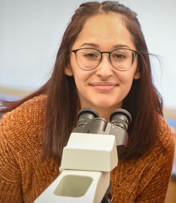 Student with microscope