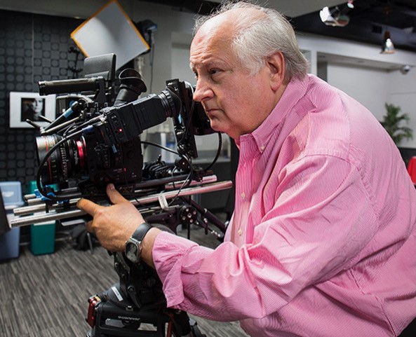 Alan Gitlin operating a film camera