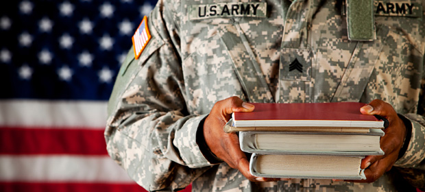 Soldier holding books
